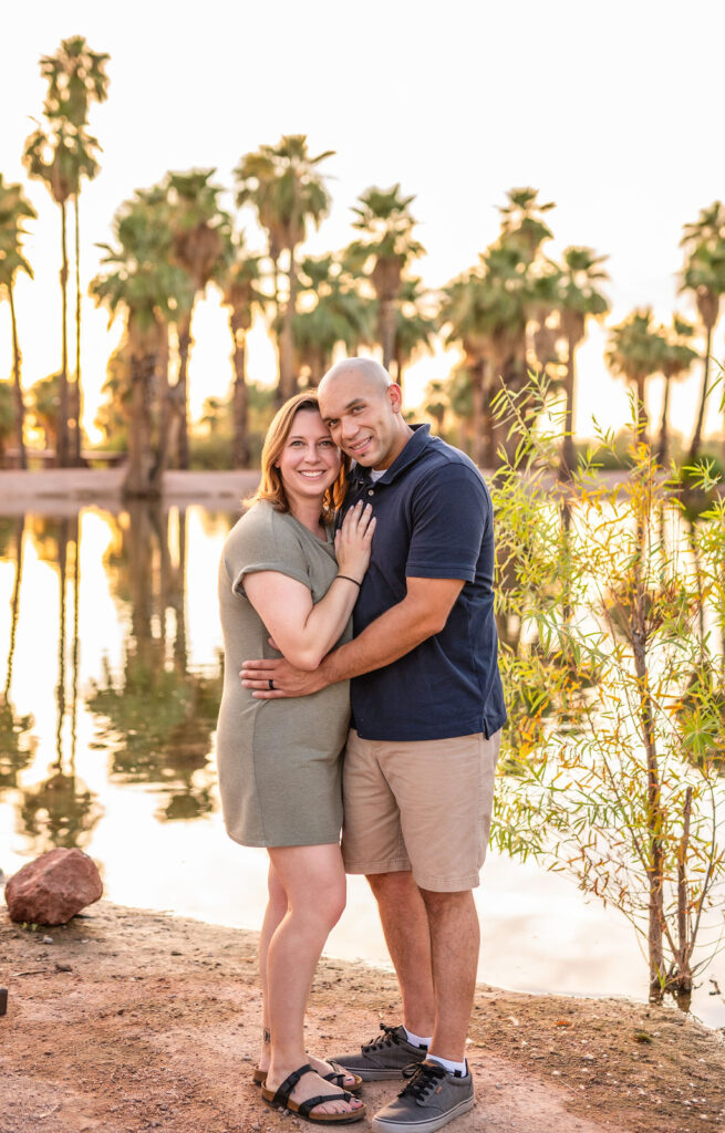 
A vibrant, candid photo of a wedding couple sharing a joyful moment during their celebration, with soft, natural lighting highlighting the colors and emotions of the day. The image captures an authentic, in-between moment that showcases the couple’s connection and the love in the air.