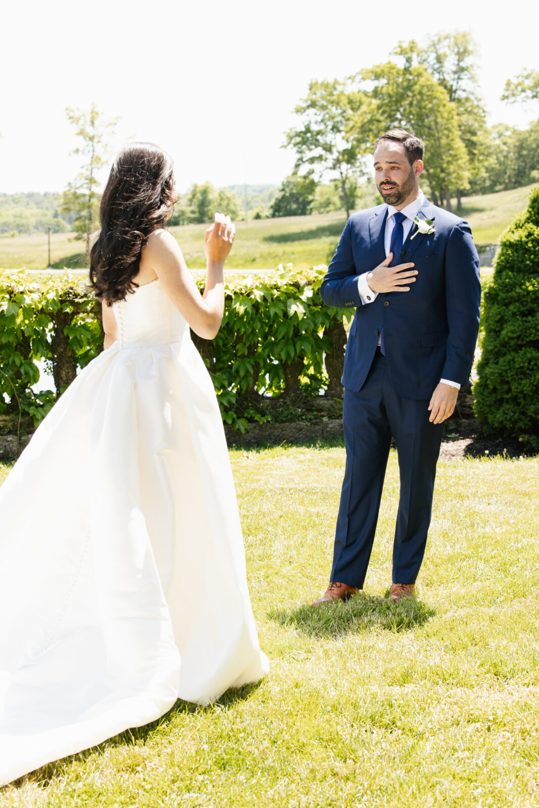 A magical moment as Alix and Wiley share their first look, filled with pure excitement and love. Wiley’s face lights up in awe as he sees Alix for the first time in her beautiful wedding gown, marking the beginning of their next chapter together. Their connection is undeniable, with their pup by their side to share in the joy.