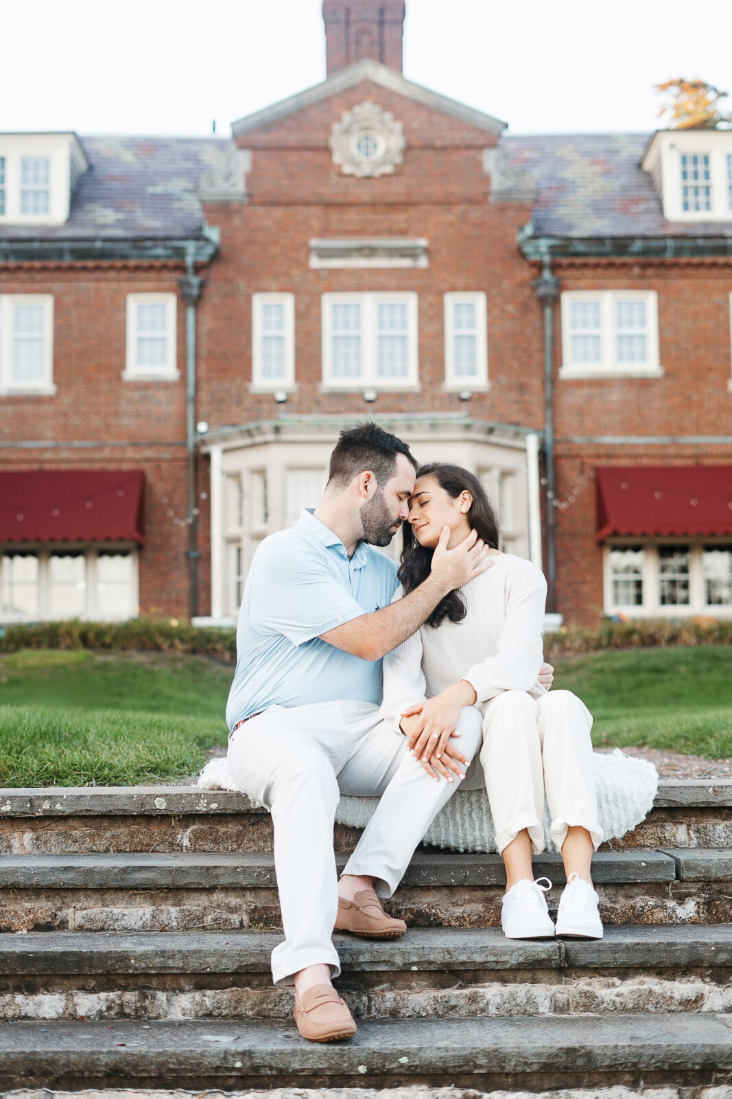 A beautiful moment captured during Alix and Wiley’s engagement session at Turner Hill, showcasing the couple’s natural connection and love. Surrounded by the estate’s stunning grounds, their smiles and laughter reflect the joy they share as they step into this exciting new chapter of their lives.