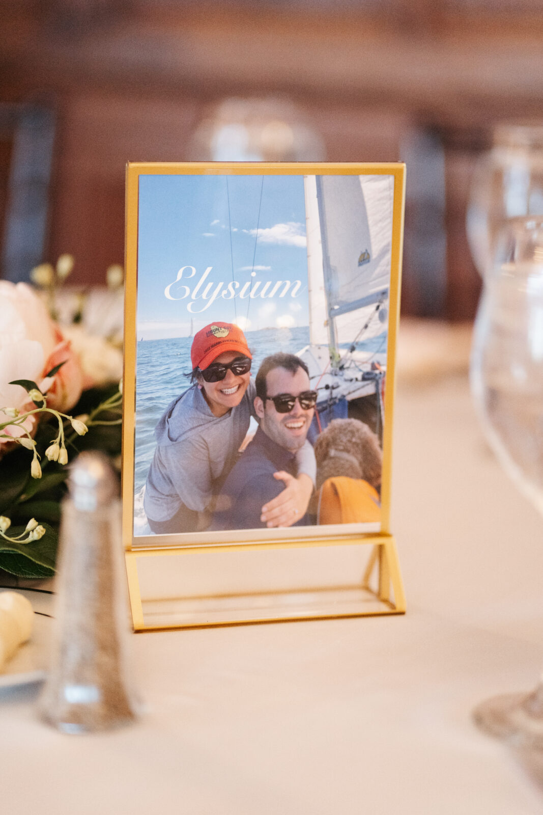 A close-up shot showcasing the stunning wedding details, including custom cufflinks, delicate floral arrangements, and the elegant invitations, all thoughtfully planned to reflect the couple’s personal style and love for one another.