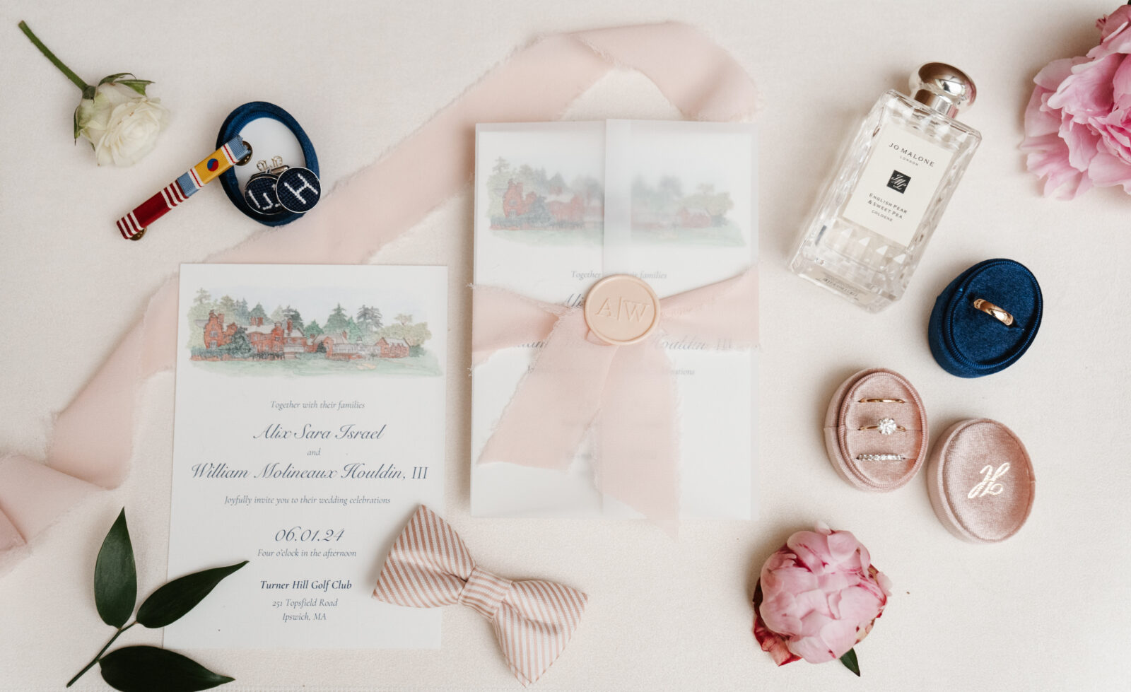 A close-up shot showcasing the stunning wedding details, including custom cufflinks, delicate floral arrangements, and the elegant invitations, all thoughtfully planned to reflect the couple’s personal style and love for one another.