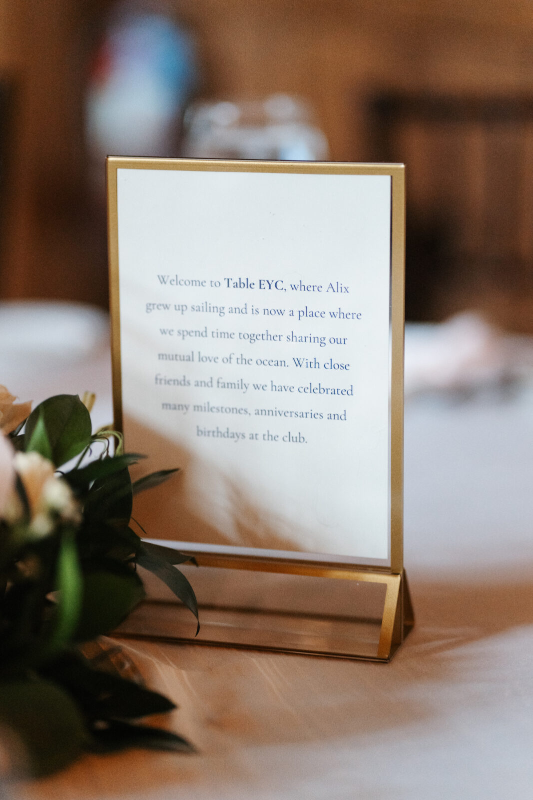 A close-up shot showcasing the stunning wedding details, including custom cufflinks, delicate floral arrangements, and the elegant invitations, all thoughtfully planned to reflect the couple’s personal style and love for one another.