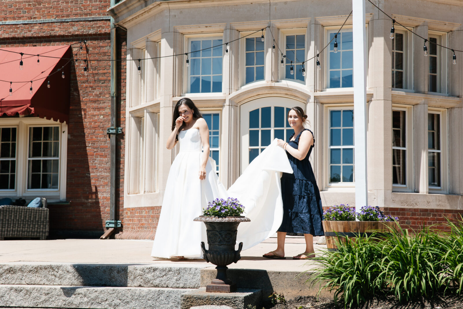 A heartfelt moment as Alix shares a first look with her dad, filled with emotion and love. His face lights up with pride and joy as he sees his daughter in her stunning wedding gown for the first time.