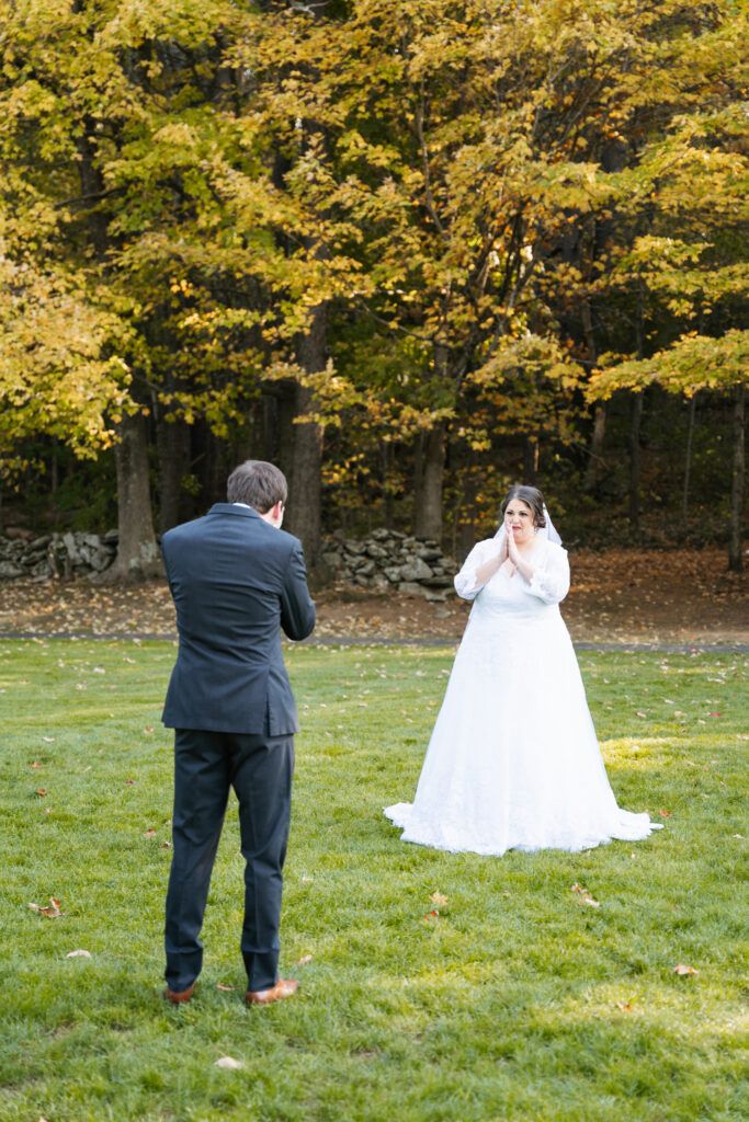 
A vibrant, candid photo of a wedding couple sharing a joyful moment during their celebration, with soft, natural lighting highlighting the colors and emotions of the day. The image captures an authentic, in-between moment that showcases the couple’s connection and the love in the air.