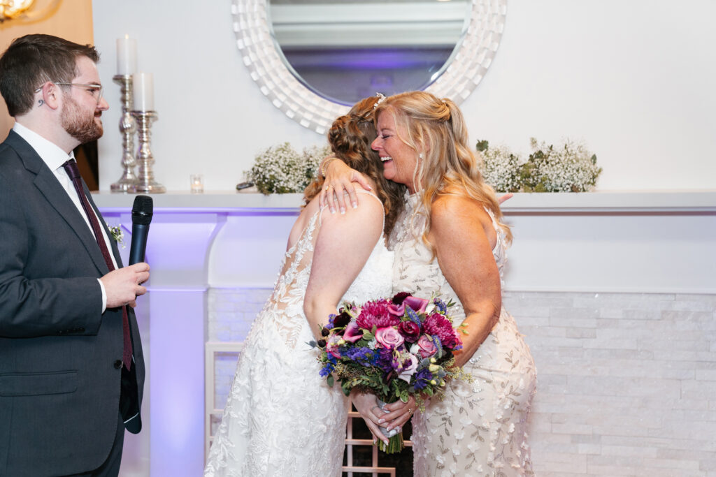 
A vibrant, candid photo of a wedding couple sharing a joyful moment during their celebration, with soft, natural lighting highlighting the colors and emotions of the day. The image captures an authentic, in-between moment that showcases the couple’s connection and the love in the air.