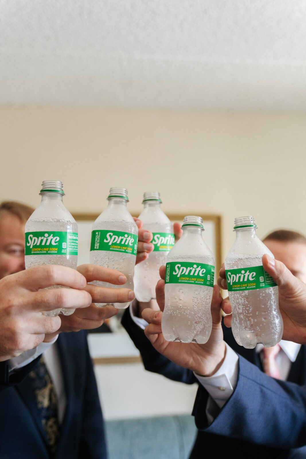 Grand View in Mendon wedding, guys cheering with sprite 