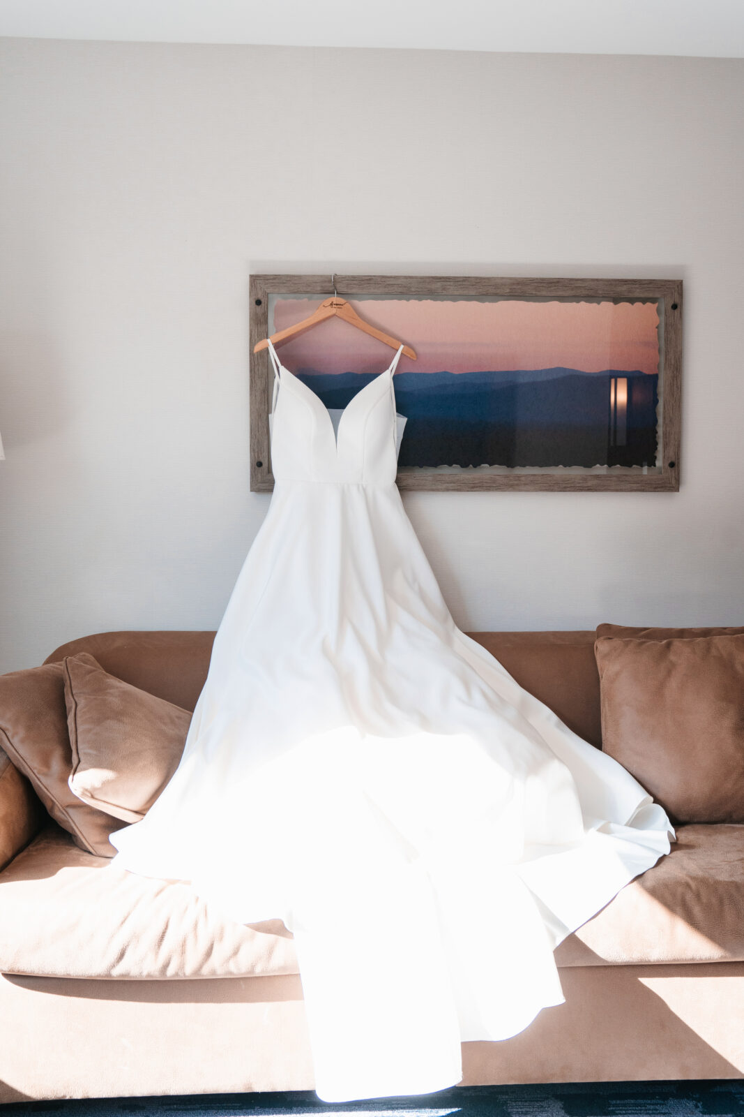 Elegant wedding flat lay with invitation suite, rings, and florals styled on soft linen at Waverly Oaks in Plymouth, MA.