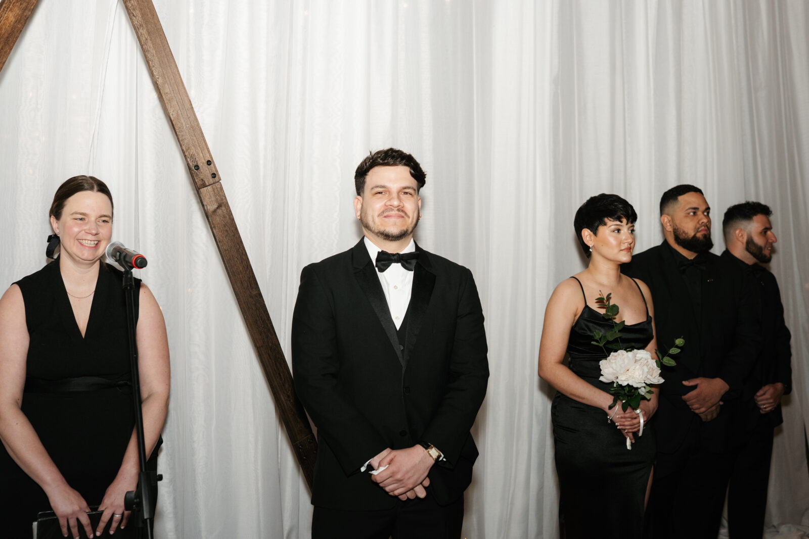 Emotional bride and groom seeing each other for the first time at their ceremony at The Venues at the Factory.