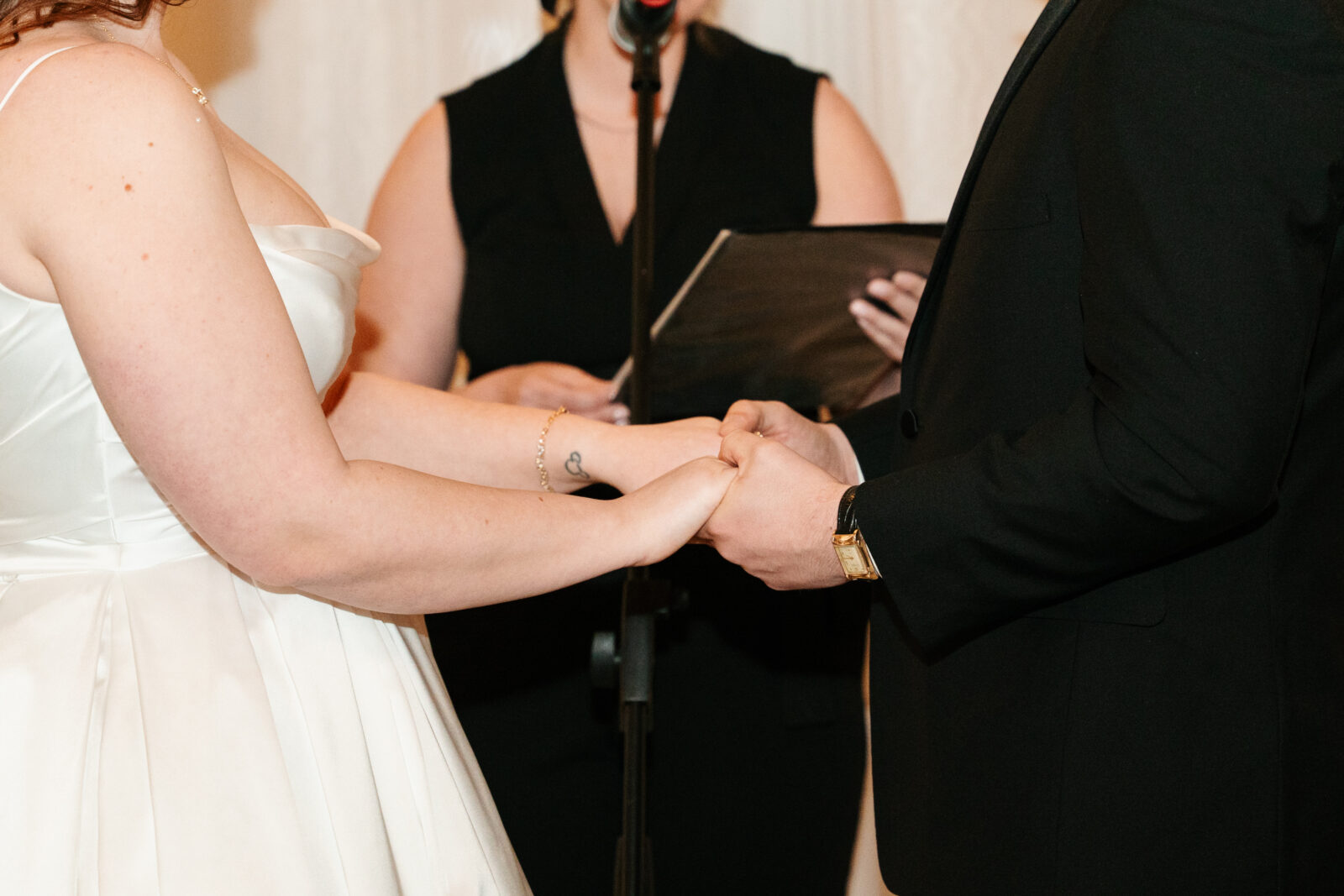 Emotional bride and groom seeing each other for the first time at their ceremony at The Venues at the Factory.
