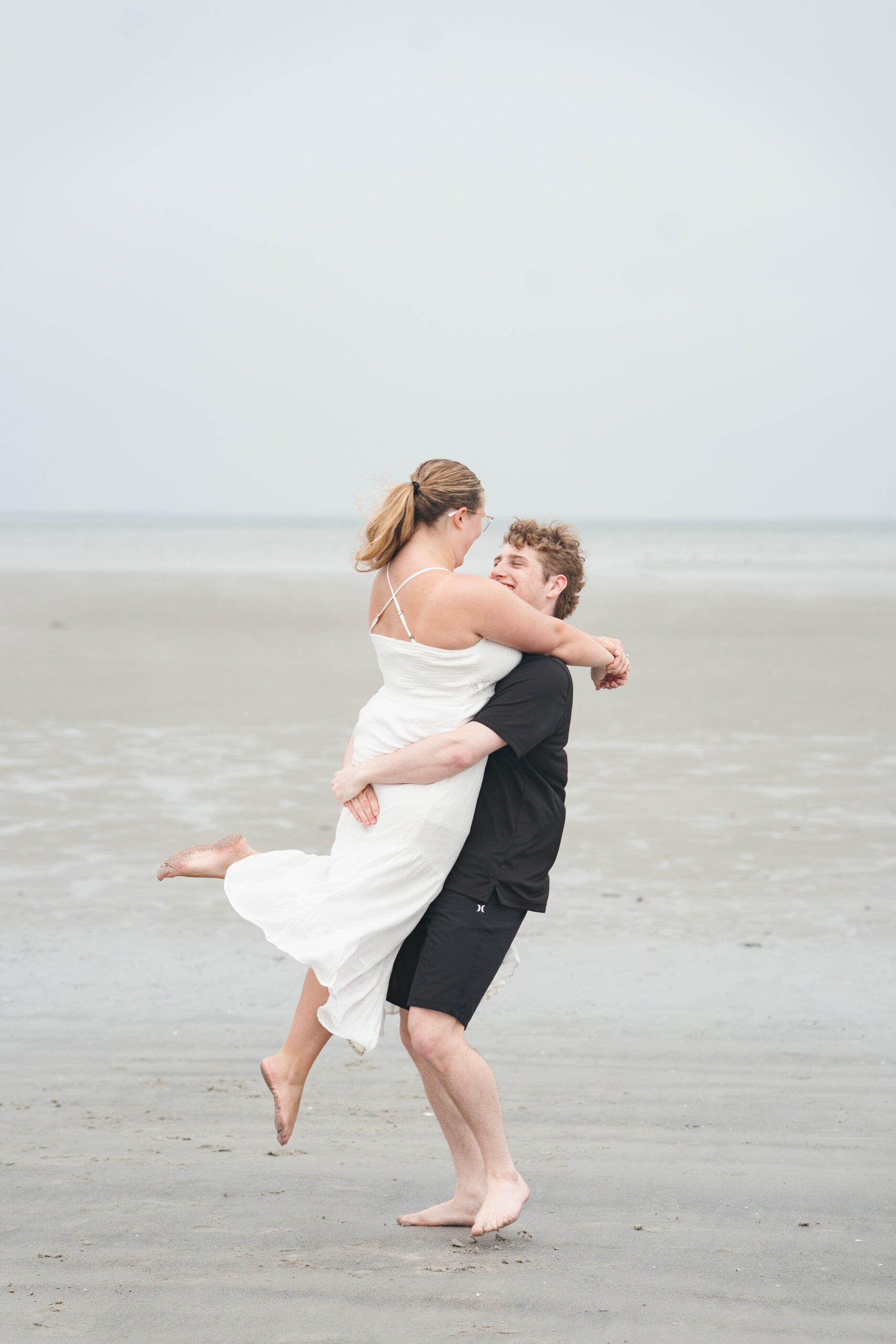Romantic foggy beach engagement session in Gloucester, MA