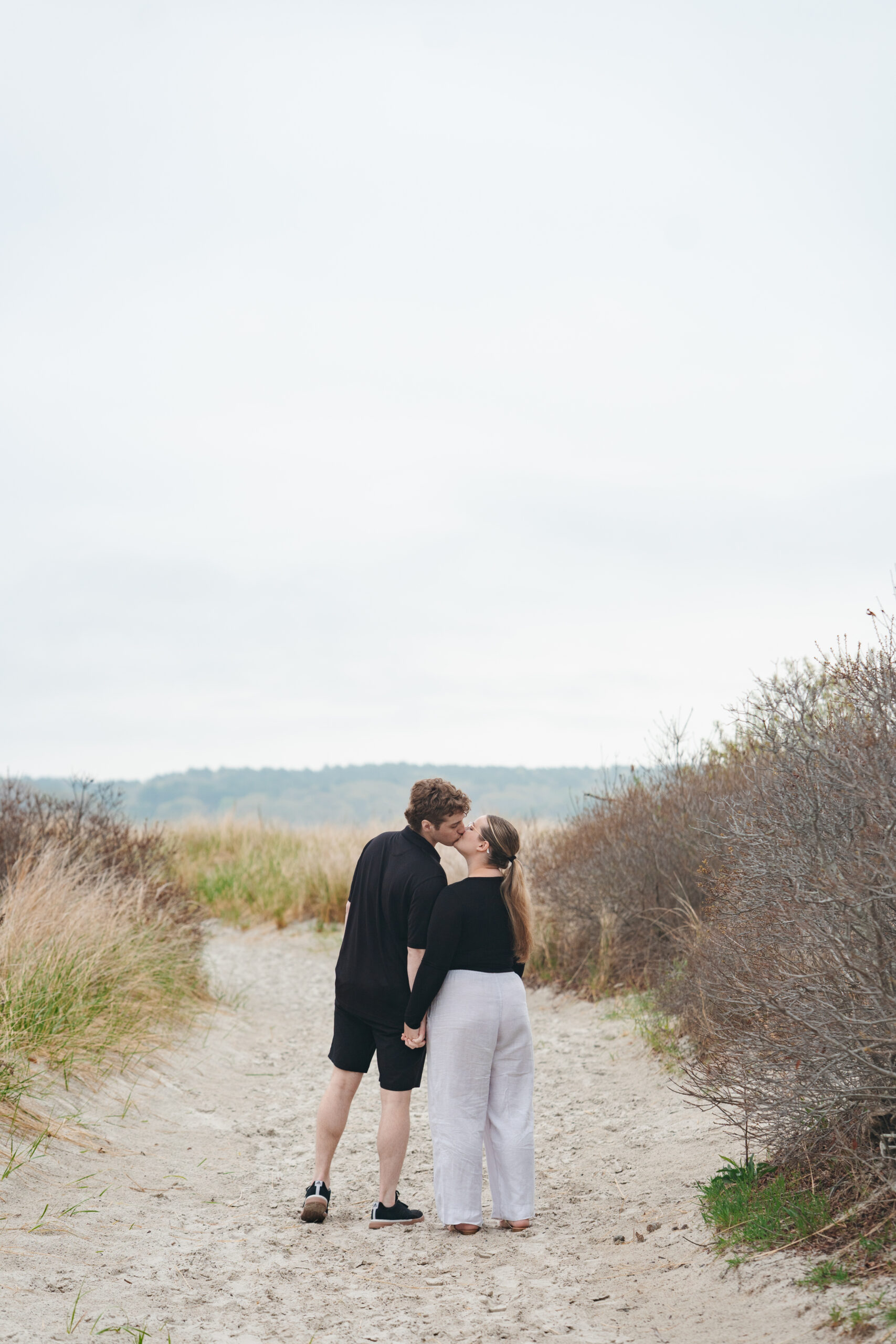 Romantic foggy beach engagement session in Gloucester, MA