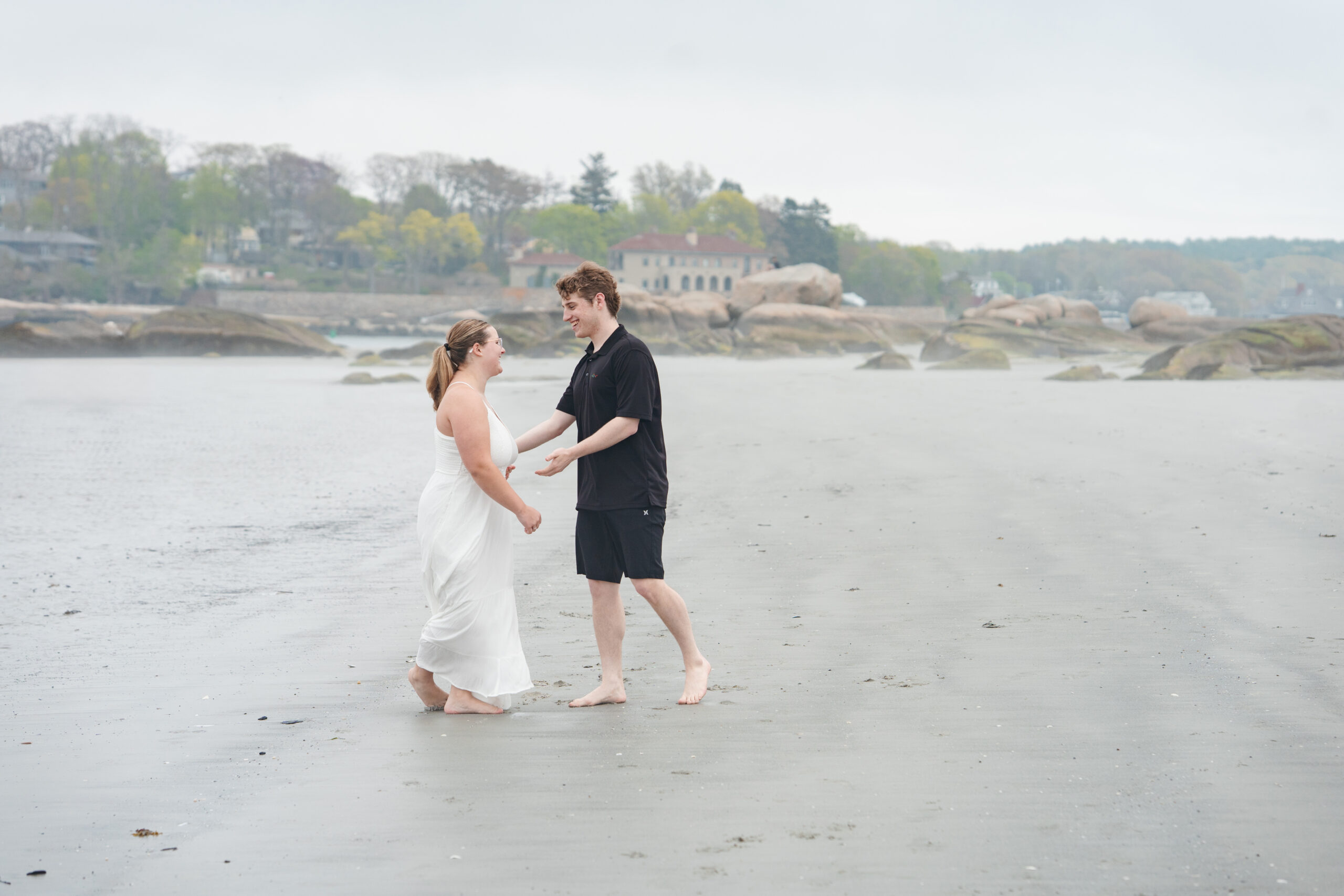 Romantic foggy beach engagement session in Gloucester, MA