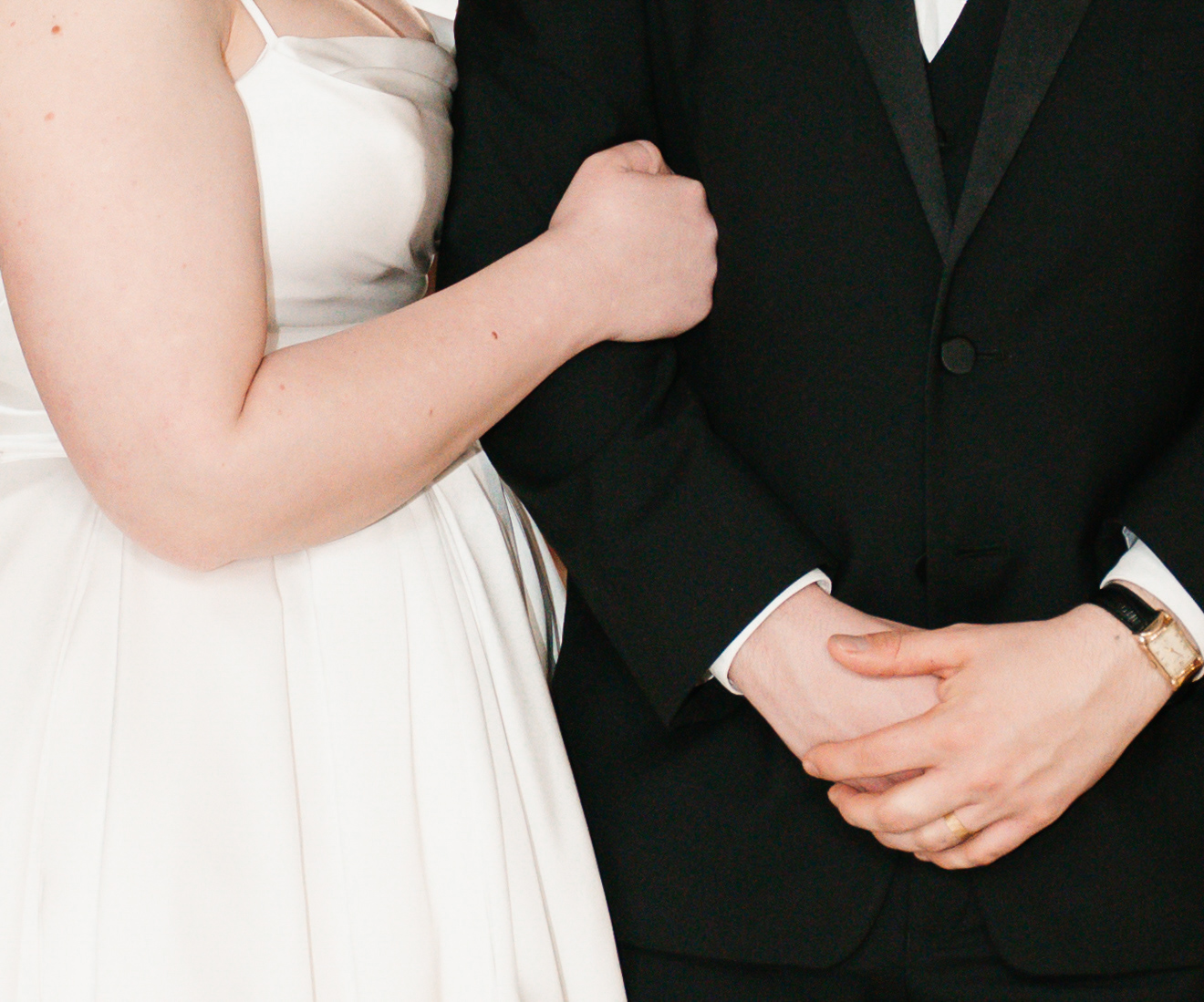 Industrial-chic wedding portraits of Emily and Nate inside The Venues at the Factory.