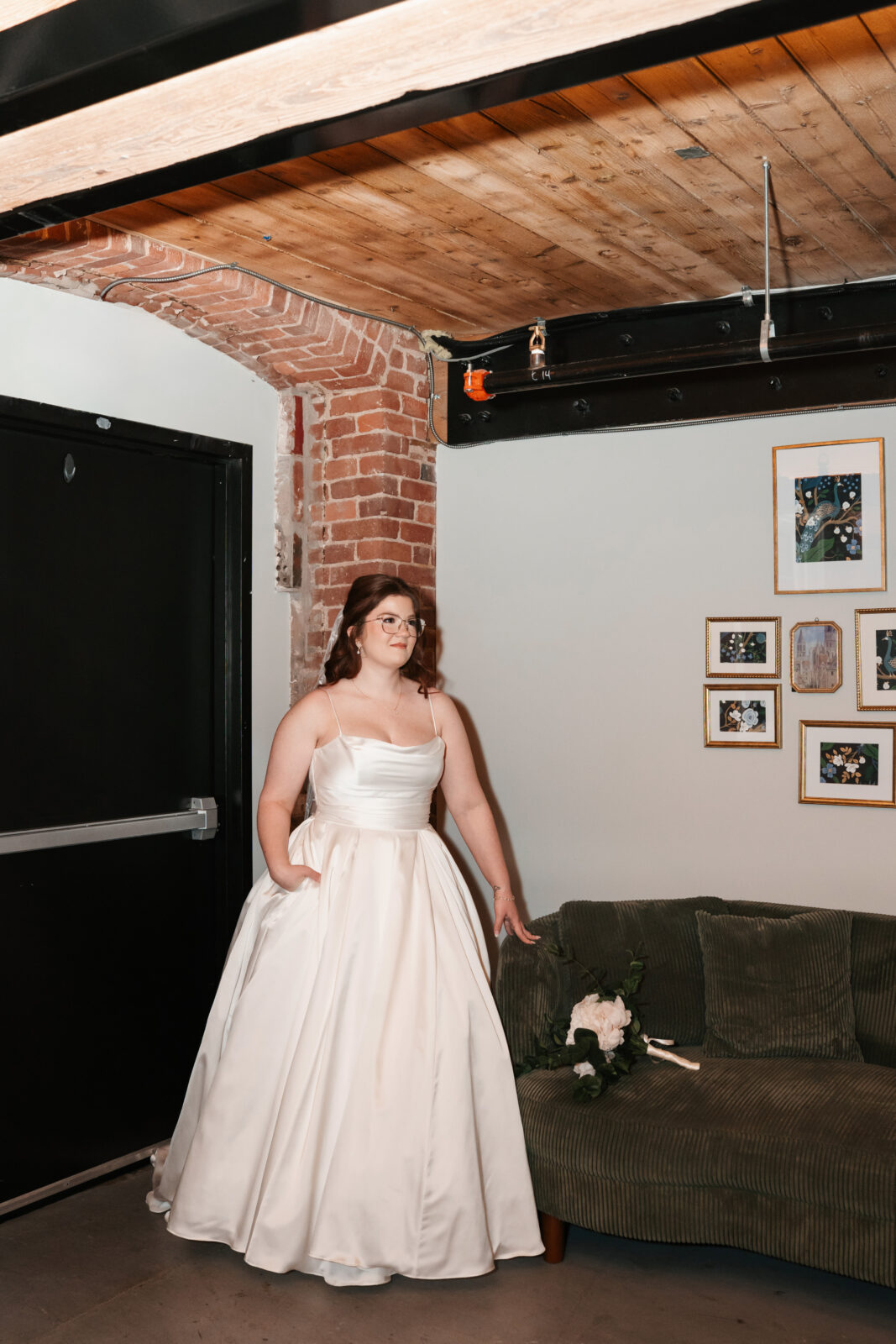 Industrial-chic wedding portraits of Emily and Nate inside The Venues at the Factory.
