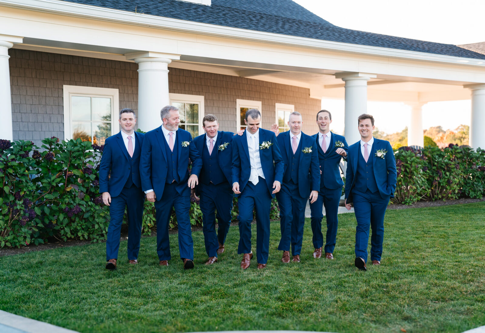 Bridal party celebrating with the couple on the lawn at Waverly Oaks in Plymouth, MA
