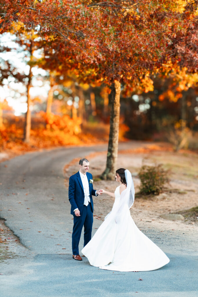 Bride and groom sharing a quiet moment at sunset on the golf course at Waverly Oaks, Plymouth, MA.