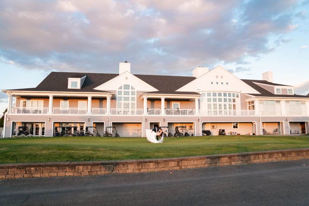 Bride and groom sharing a quiet moment at sunset on the golf course at Waverly Oaks, Plymouth, MA.