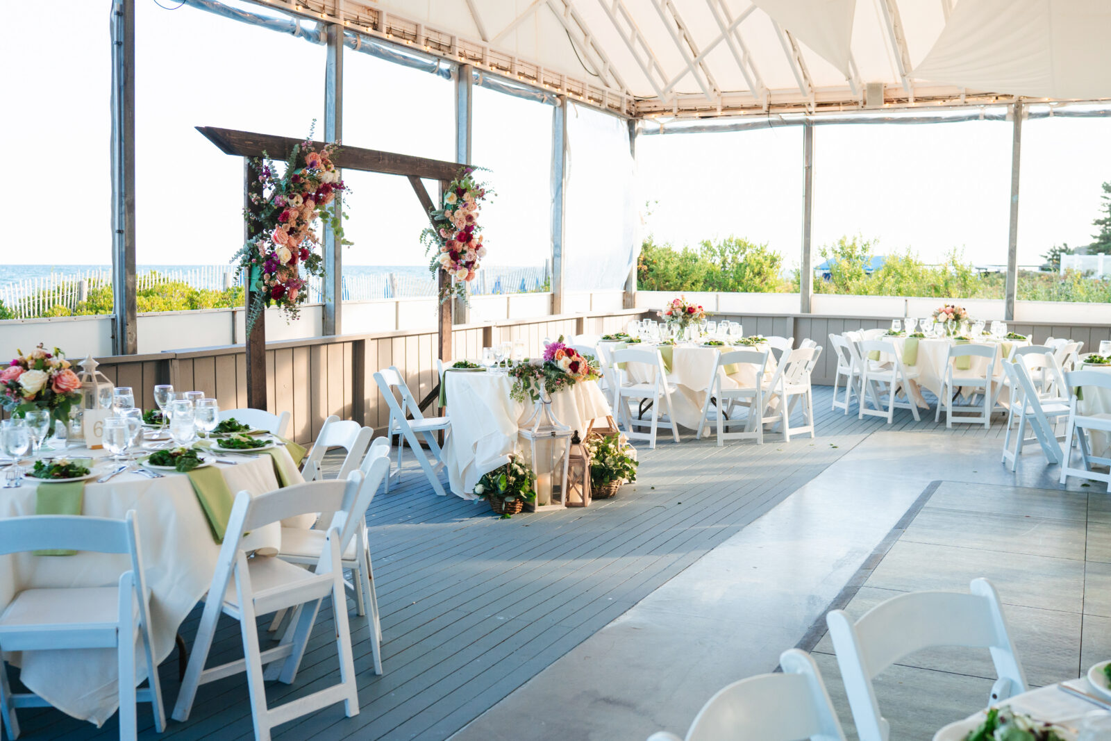 Spacious reception tent at a Cape Cod waterfront wedding