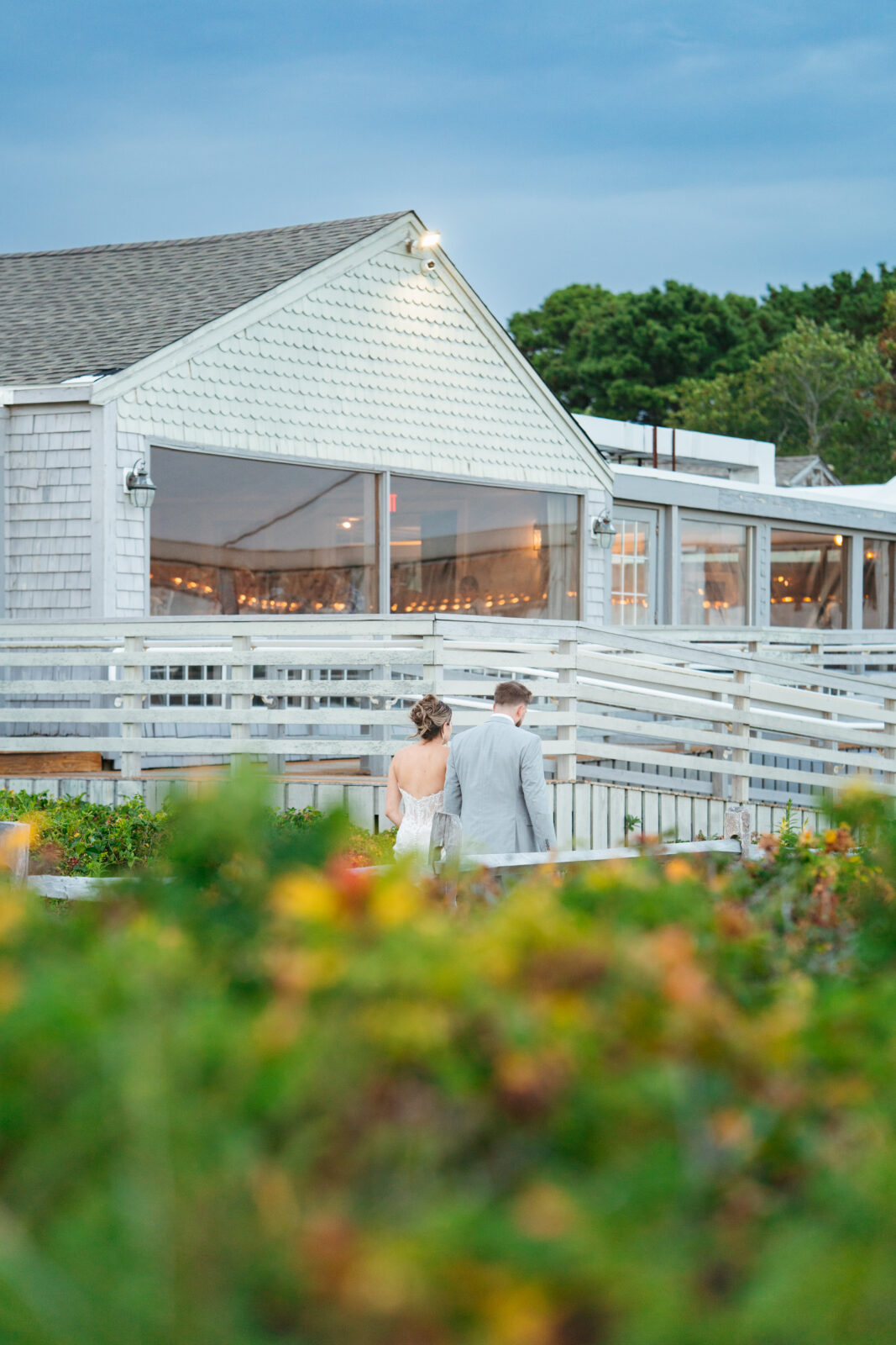 Oceanfront sunset wedding portraits in Mashpee