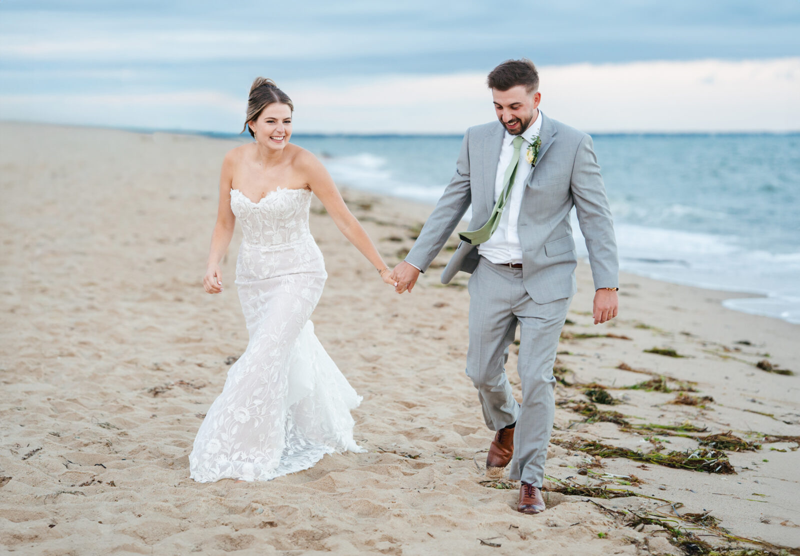 Oceanfront sunset wedding portraits in Mashpee