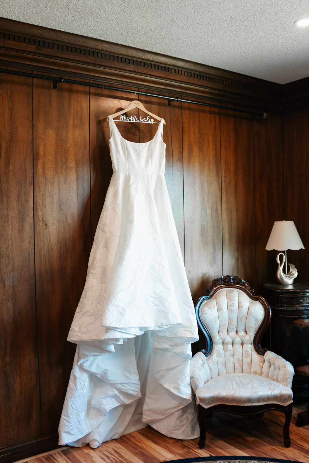 Wedding dress hanging in Lakeview Inn bridal suite