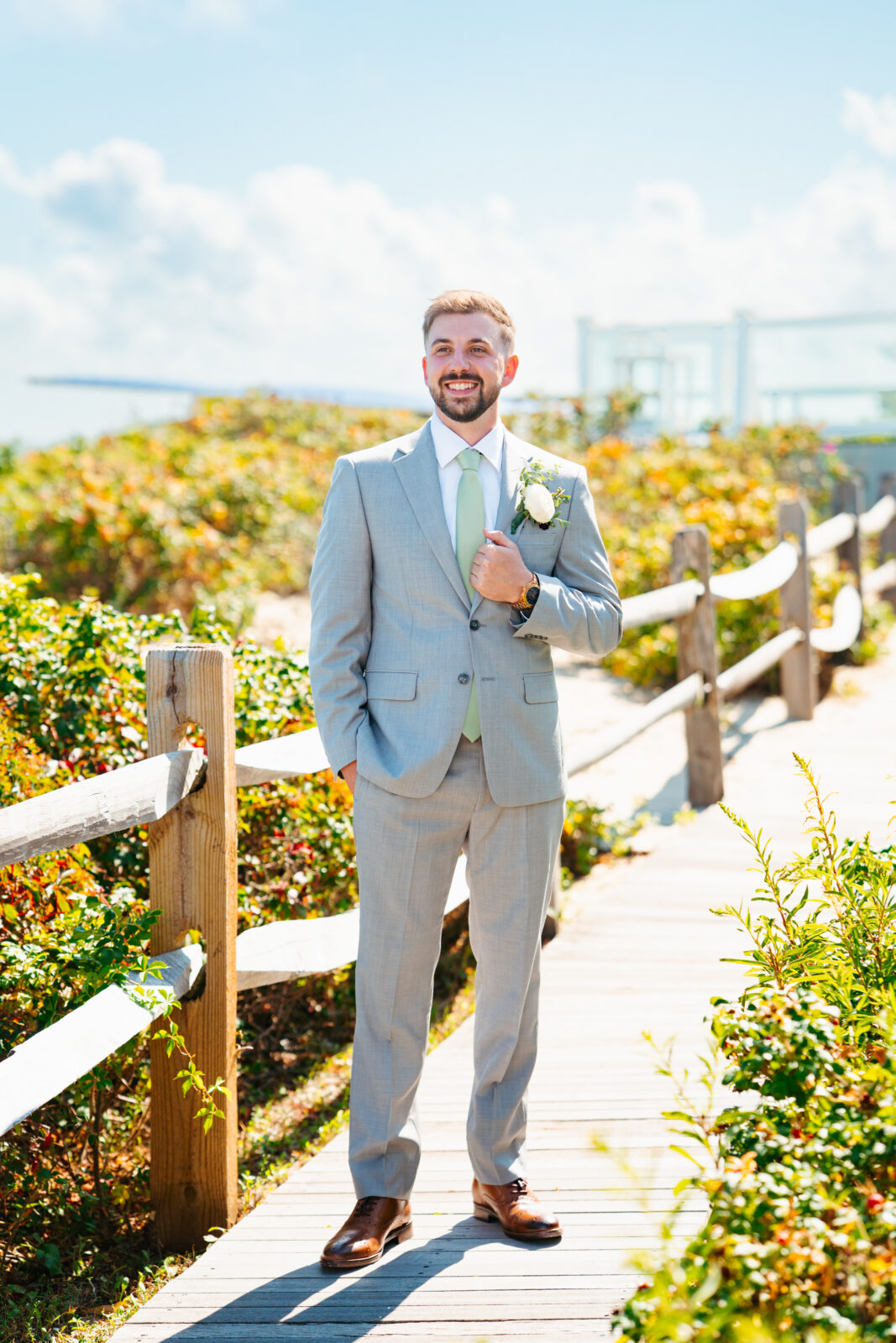 Bride and groom portraits on the beach in Cape Cod