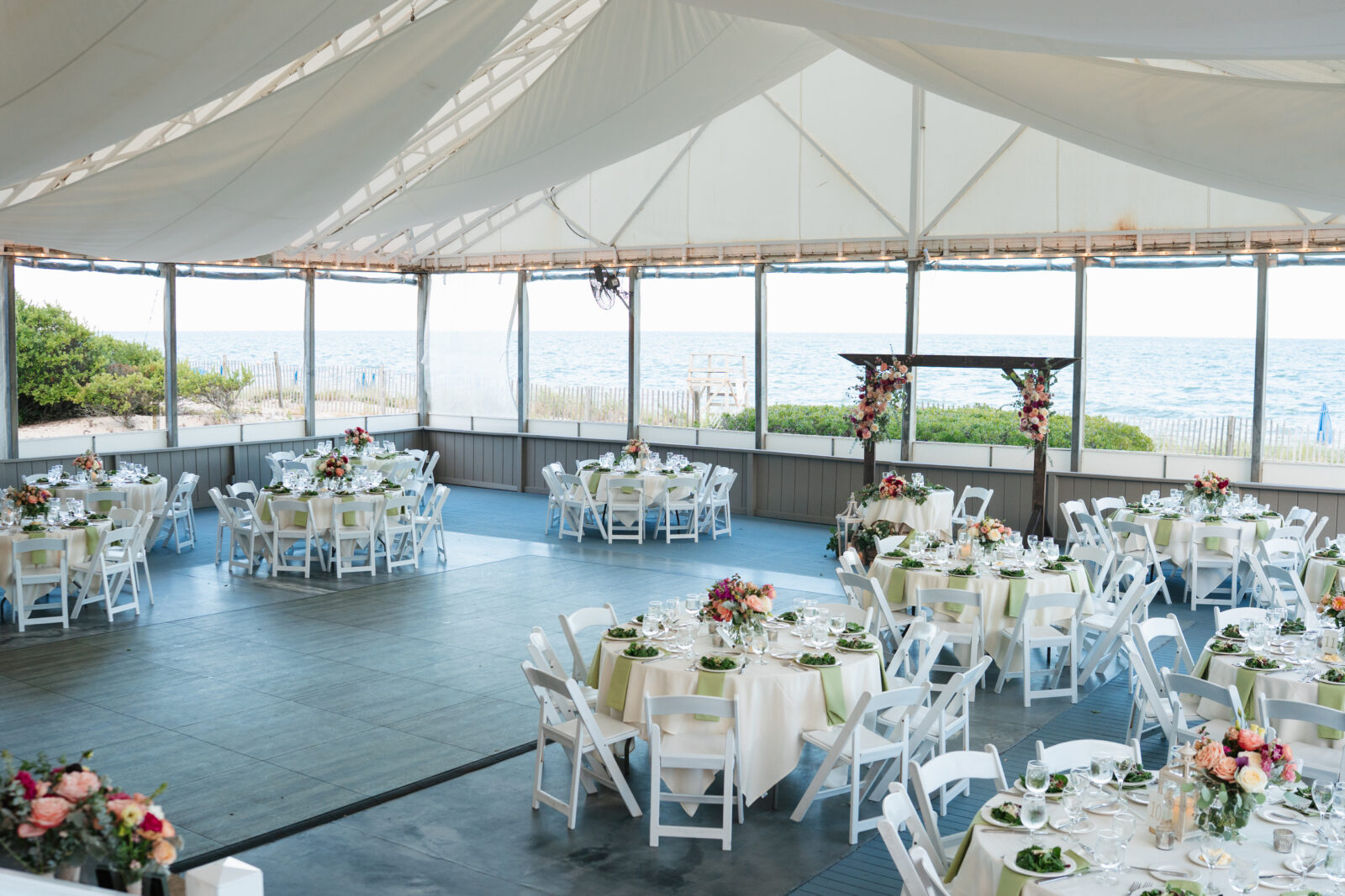 Coastal reception tent at a Cape Cod beachfront wedding venue