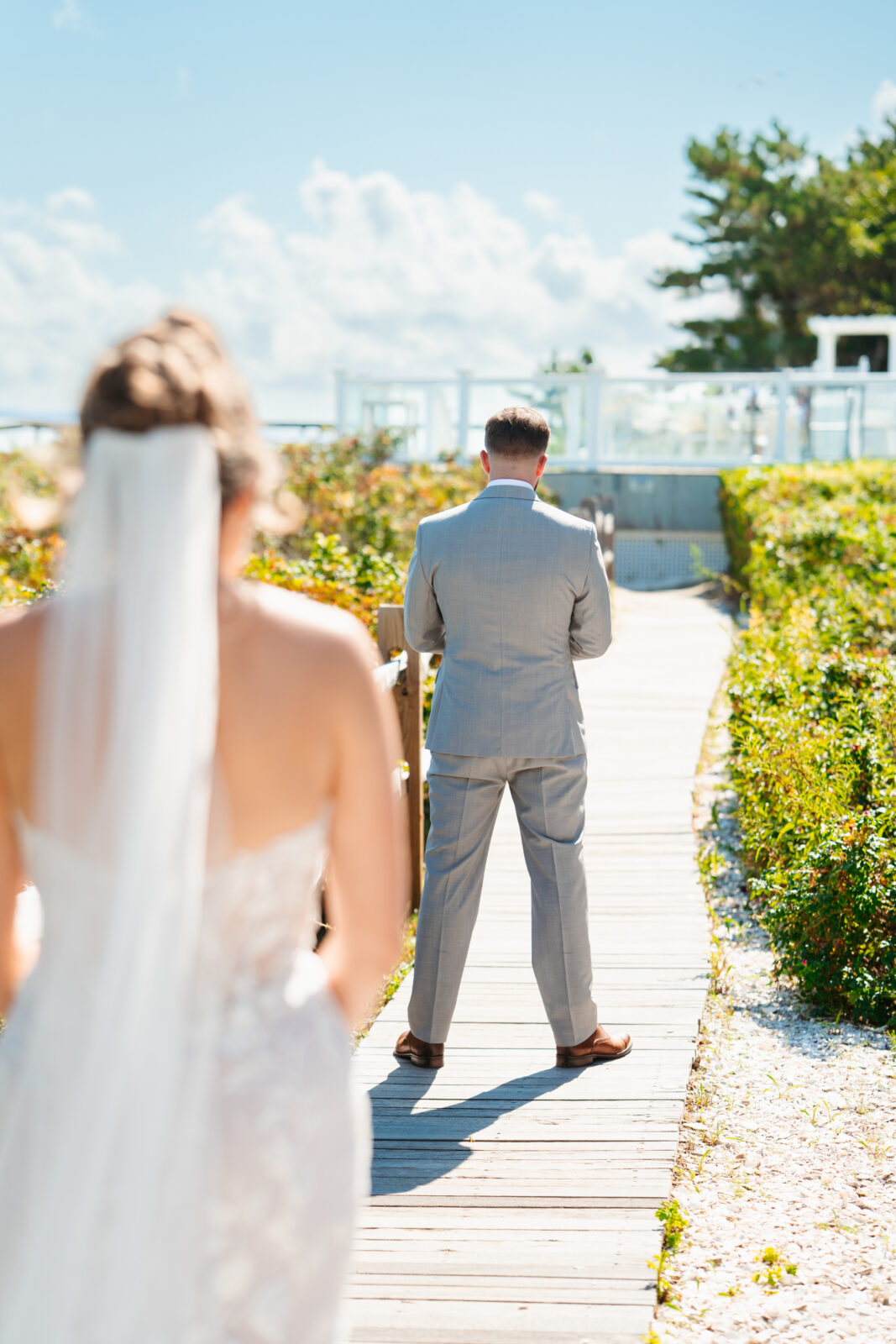 Bride and groom first look at an oceanfront Massachusetts wedding