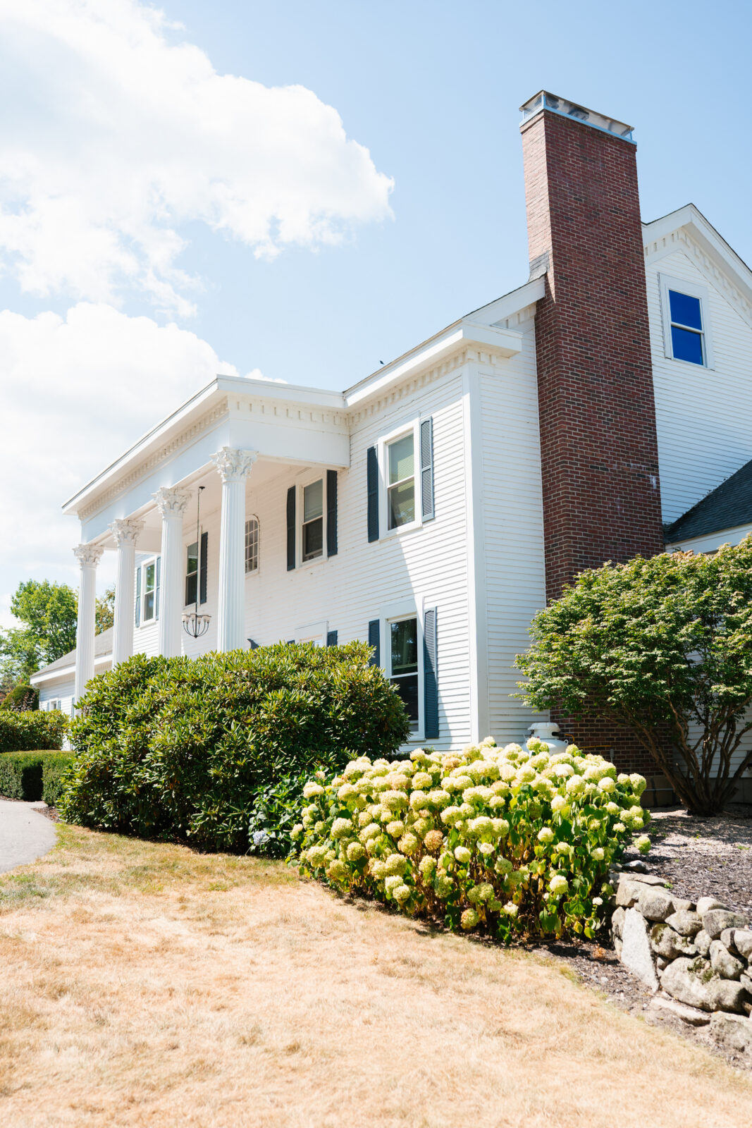 Front exterior of Lakeview Inn with mountain backdrop