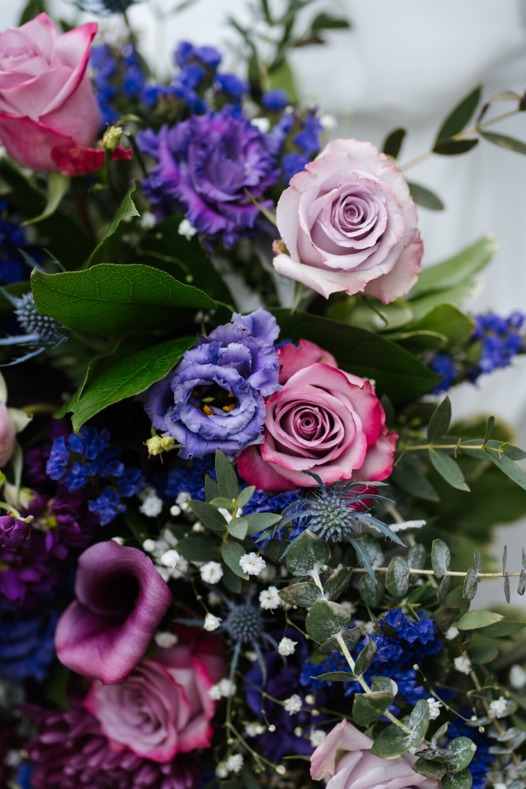 Flower arrangements throughout the garden ceremony space at Saphire Estate
